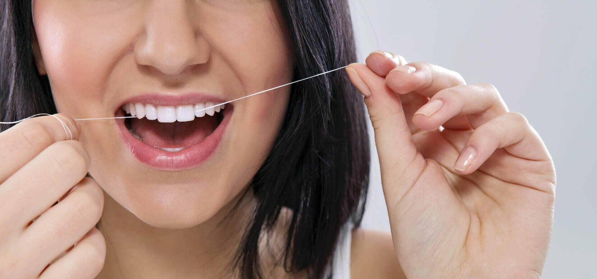 Implant care with dental floss